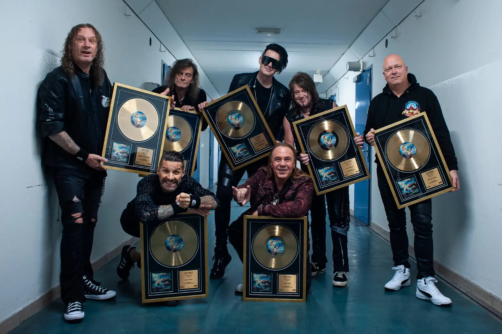 Helloween with gold records backstage